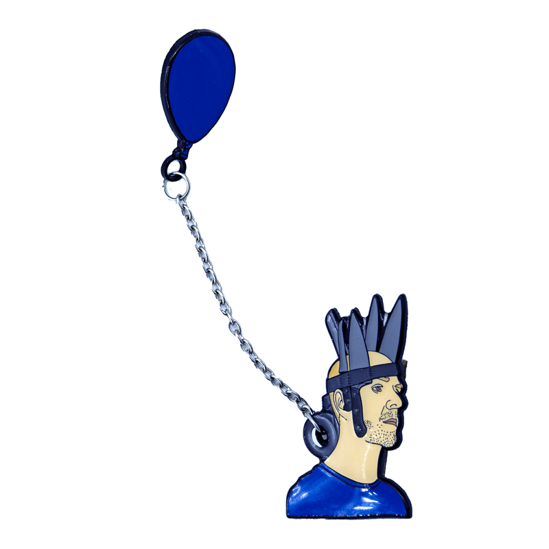 jan hakon erichson enamel pin with Jan wearing a blue shirt and  crown of duct taped knives with a blue balloon attatched to a chain goin through the duct tape roll.  