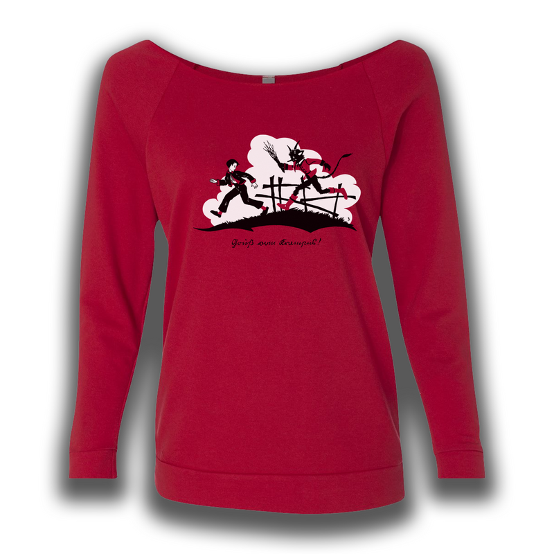 A red shirt long sleeved raglan sweatshirt featuring artwork from an antique Krampus greeting card. Krampus chases a child with a bundle of sticks. The words read "Gruss vom Krampus!"