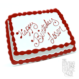 An enamel pin in the shape of a white and red birthday cake, with faux icing text that says "Happy Birthday Loser".